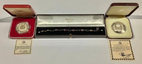 A silver fancy link bracelet set with six polished Blue John oval cabochons, 15cm long, boxed; a