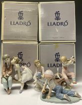 A Lladro figure, Best Friend, 7620, boxed; others, Pick of the Litter, 7621, boxed; All Aboard,