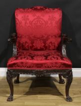 A George III Revival Gainsborough armchair, stuffed-over upholstery, outswept arms, cabriole legs,