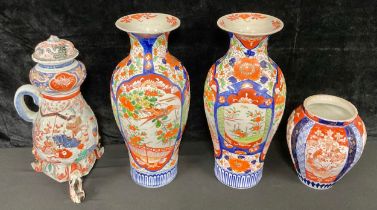 Ceramics - a pair of 19th century Japanese Imari vases, each 40cm high; another, a hot water jug and