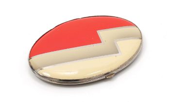 An 'Art Deco' style oval shaped powder compact, by Gwenda, the hinged lid decorated with a bold