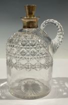 An Edwardian silver mounted hobnail-cut glass gin flagon, tapered stopper, loop handle, star-cut