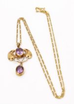 An 'Art Nouveau' style .925 gold plated silver and amethyst set pendant, in the manner of Murrle