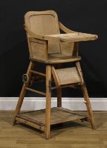 An early 20th century metamorphic child's combination high chair and learning station, 94.5cm high