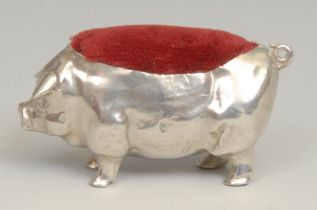 An Edwardian silver novelty pin cushion, as a pig, 5.5cm long, Levi & Salaman, Birmingham 1904