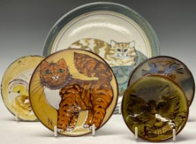 A Highland Stoneware plate, painted with a cat resting on a cushion; four smaller Chelsea Pottery