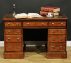 A Victorian mahogany twin pedestal desk, rectangular top with inset tooled and gilt writing