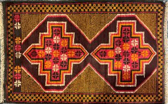 Oriental Carpets - a hand knotted woollen Baluchi rug, 130cm x 87cm