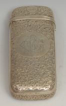 A Victorian silver rounded rectangular cigar or cheroot case, profusely engraved with scrolling