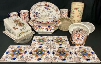 A set of three Keeling & Co. Daisy pattern graduated jugs, oval serving plate, biscuit barrel and