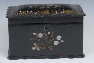 A Victorian papier mache shaped rectangular tea caddy. hinged cover enclosing a pair of lidded