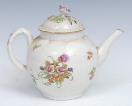 A Worcester globular teapot and cover, painted in polychrome with summer flowers, 14.5cm high, c.