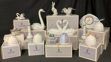 A Lladro model, Graceful Swan, 5230, boxed; others, Hoppity Hop, 5886, boxed; Endless Love, 6585,