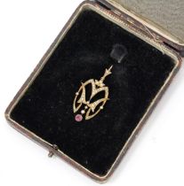 A late Victorian Art Nouveau 15ct gold openwork pendant, set with differing sized seed pearls,