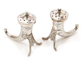 A Norwegian silver miniature cornucopia shaped cruet set, comprising salt and pepper pots, both