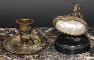 A 19th century French bronze novelty trinket dish, as an anthropomorphic monkey holding a mother