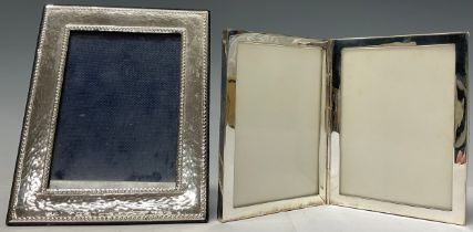 A 20th century sterling silver photograph frame, planished frame with beaded border, marked 925,