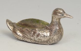 An Edwardian silver novelty pin cushion, as a duck, 6.5cm long, Levi & Salaman, Birmingham 1908