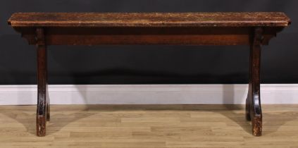 A late Victorian Gothic Revival vernacular pine bench, chamfered rectangular top, shaped end