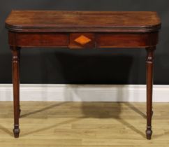 A George III mahogany tea table, hinged top above a deep frieze inlaid with a satinwood lozenge