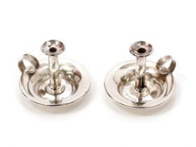 A pair of late Victorian silver miniature novelty toy chambersticks, each 4cm high, Chester 1892 (2)