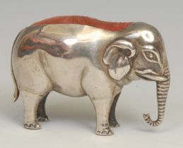 A large Edwardian silver novelty pin cushion, as an elephant, 7cm long, Birmingham 1905