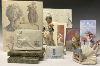 A Lladro figure, Ballerina; another, Girl in Traditional Dress with Pink Flowers; a Lladro goose;