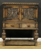 A 17th century style oak food cupboard, in the manner of Titchmarsh & Goodwin, 130cm high, 105cm