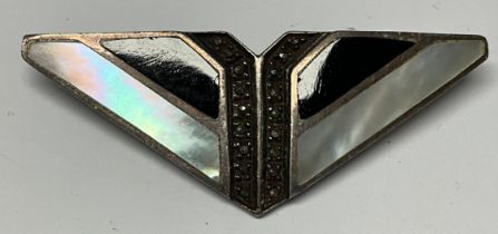 An Art Deco continental silver and marcasite triangular brooch, inlaid with mother-of-pearl and