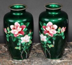 A pair of Japanese ginbari and cloisonné enamel ovoid vases, each decorated with flowers and