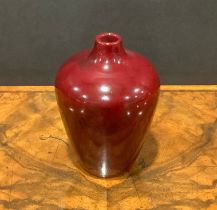 A Bernard Moore flambé miniature vase, 12cm high, incised mark with initials