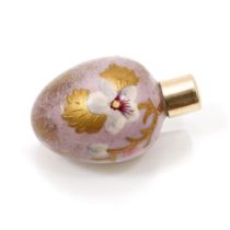 A late 19th century miniature porcelain scent bottle, hand painted with flowers and picked out in