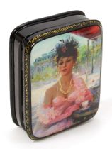 A Russian black lacquered rounded rectangular shaped box and cover, the cover decorated with a young