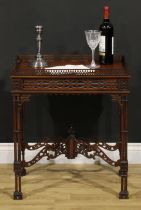 A Chippendale Revival mahogany fretwork and blind fretwork silver table, galleried rectangular
