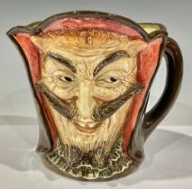 A Royal Doulton 'Mephistopheles' character jug, the base bearing the verse 'When the devil was sick,