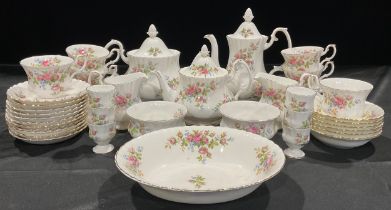 A Royal Albert Moss Rose pattern tea service, comprising a large teapot and cover, a medium teapot
