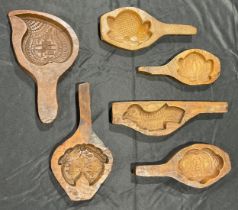 Treen - 19th century French hand-carved butter moulds, comprising a cuckoo, a pineapple, etc (5)