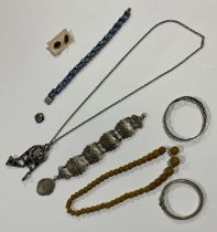 Silver bracelets; amber beads; etc