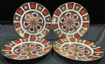 A set of four Royal Crown derby side plates, 21.5cm diameter, first quality, printed marks