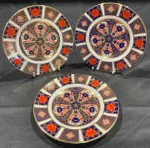 A set of three Royal Crown Derby Imari 1128 pattern tea plates, 16cm diameter, first quality,