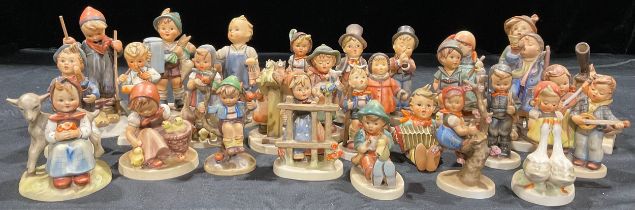A collection of Goebel Hummel figures including Hear Ye, Hear Ye; For Father; Boots; Street