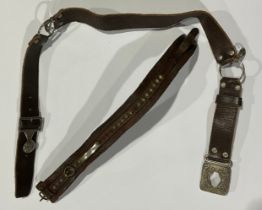 A leather Girl Guides belt; a leather studded dog collar