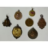 Two Georgian fobs; six others