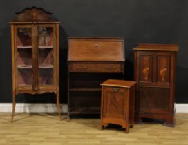 An Edwardian display cabinet, 141cm high, 61cm wide, 35cm deep; an early 20th century music room