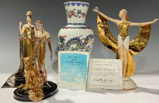 A Franklin Mint porcelain figure, Sunrise in Gold, limited edition, 27.5cm high, with certificate;