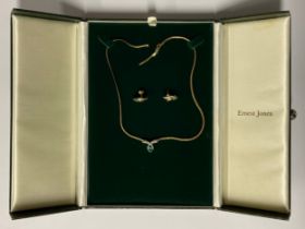 A 9ct gold necklace set with green and clear stones, the chain broken, 5.6g; a pair of similar 9ct