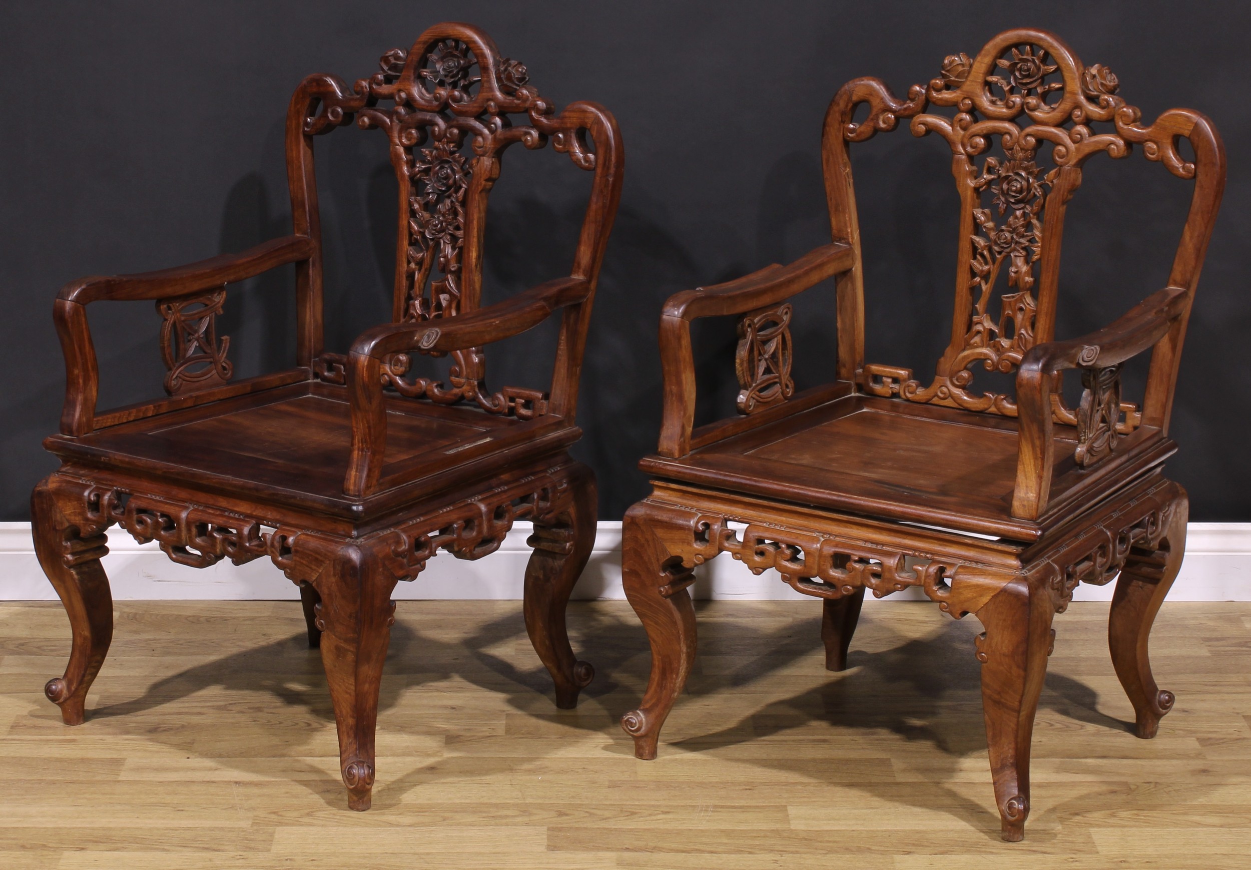 A pair of Chinese hardwood armchairs, each with a shaped back pierced and carved with scrolls and - Image 3 of 4