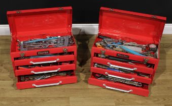A pair of Clarke steel tool boxes, painted red, hinged covers above three graduated sliding drawers,