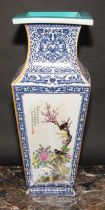 A large Chinese tapered square vase, decorated in polychrome enamels with panels of fanciful birds