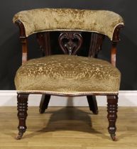 A Victorian walnut and mahogany club elbow chair, 76cm high, 73cm wide, the seat 54cm wide and